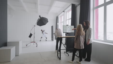photo-session-for-sport-magazine-team-is-photographing-professional-football-player-in-studio